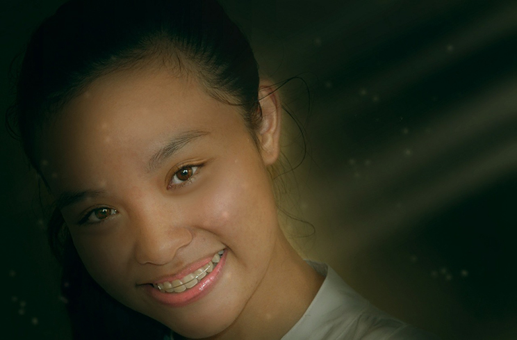 image of a girl with braces